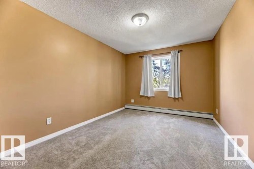 211 245 Edwards Dr Sw, Edmonton, AB - Indoor Photo Showing Other Room