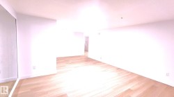 Unfurnished room featuring light wood-type flooring - 