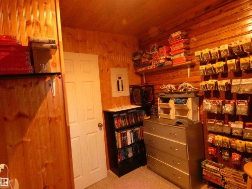 Currently used for hobby and crafts, this could be a secondary bedroom or den perhaps. - 13 Willow Place, Rural Barrhead County, AB 