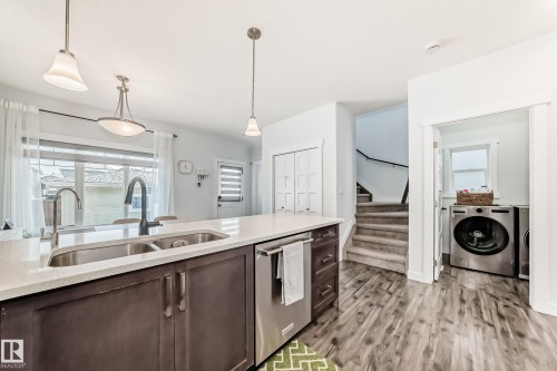 76 Strawberry Lane, Leduc, AB - Indoor Photo Showing Kitchen With Double Sink