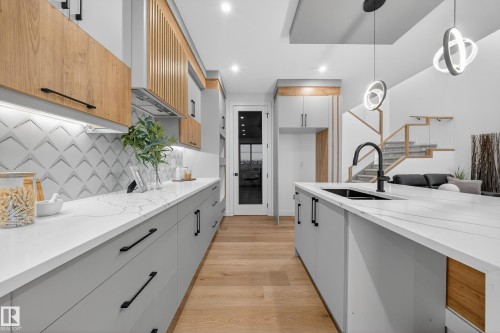 212 Crystal Creek Drive, Leduc, AB - Indoor Photo Showing Kitchen With Double Sink With Upgraded Kitchen