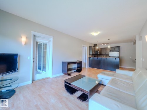 12 671 Silver Berry Road, Edmonton, AB - Indoor Photo Showing Living Room With Fireplace