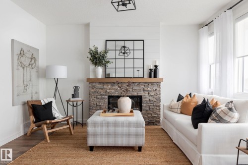 16 Emerald Way, Spruce Grove, AB - Indoor Photo Showing Living Room With Fireplace