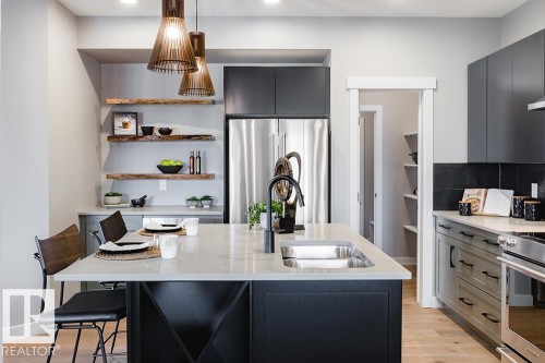 9389 Cooper Bend Bend, Edmonton, AB - Indoor Photo Showing Kitchen With Double Sink