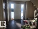 Entryway featuring healthy amount of natural light and stairs - 4213 42 Avenue, Innisfail, AB  - Indoor Photo Showing Other Room 