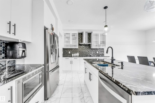 1216 15 Street, Edmonton, AB - Indoor Photo Showing Kitchen With Stainless Steel Kitchen With Double Sink With Upgraded Kitchen