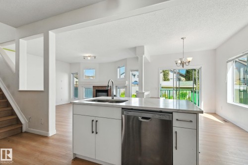 7836 7 Avenue, Edmonton, AB - Indoor Photo Showing Kitchen With Double Sink