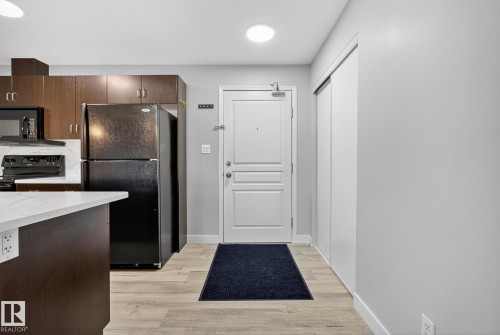 222 1180 Hyndman Road, Edmonton, AB - Indoor Photo Showing Kitchen