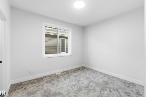 Unfurnished room with baseboards and carpet floors - 94 Eldridge Pointe, St. Albert, AB - Indoor Photo Showing Other Room