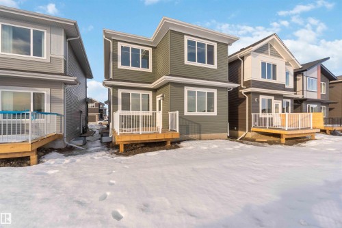 View of front of house with a deck - 94 Eldridge Pointe, St. Albert, AB - Outdoor With Facade