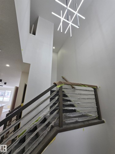Staircase featuring recessed lighting - 7706 174A Avenue, Edmonton, AB - Indoor Photo Showing Other Room