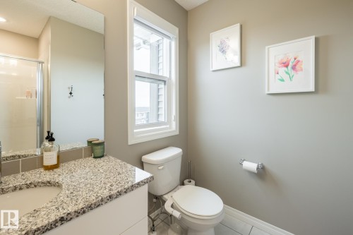 Full bathroom with vanity, a shower stall, and tile patterned flooring - 5 2072 Wonnacott Way, Edmonton, AB - Indoor Photo Showing Bathroom