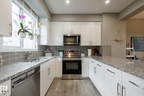 5 2072 Wonnacott Way, Edmonton, AB - Indoor Photo Showing Kitchen With Double Sink With Upgraded Kitchen