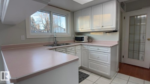 13516 42 Street, Edmonton, AB - Indoor Photo Showing Kitchen With Double Sink