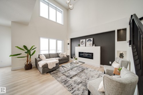 7156 177 Avenue, Edmonton, AB - Indoor Photo Showing Living Room With Fireplace