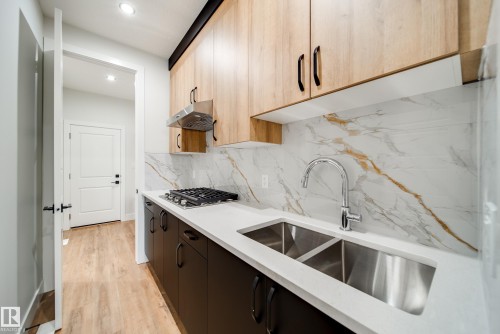 7156 177 Avenue, Edmonton, AB - Indoor Photo Showing Kitchen With Double Sink With Upgraded Kitchen