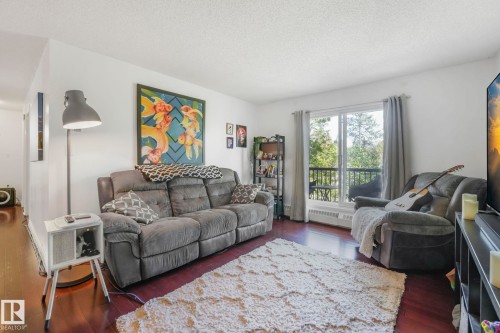 309 10636 120 Street, Edmonton, AB - Indoor Photo Showing Living Room