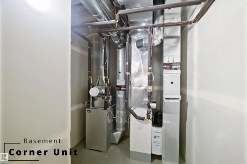 Utility room with heating unit - 7585 174A Avenue, Edmonton, AB - Indoor Photo Showing Basement