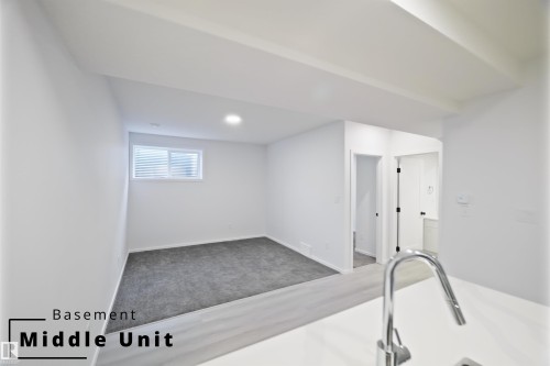 Interior space featuring carpet floors and recessed lighting - 7585 174A Avenue, Edmonton, AB - Indoor Photo Showing Other Room