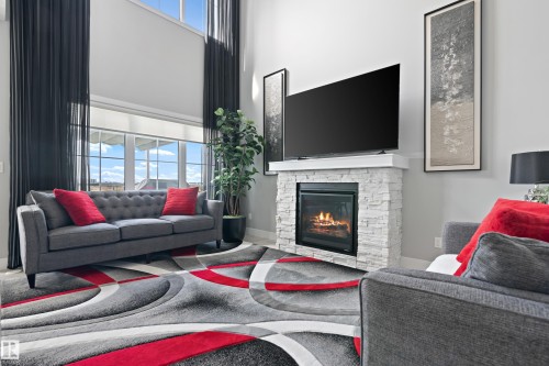 2654 Donaghey Crescent, Edmonton, AB - Indoor Photo Showing Living Room With Fireplace