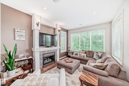1673 James Mowatt Trail, Edmonton, AB - Indoor Photo Showing Living Room With Fireplace