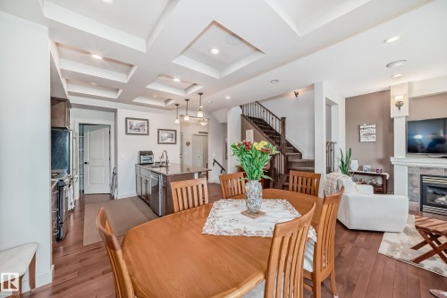 1673 James Mowatt Trail, Edmonton, AB - Indoor Photo Showing Dining Room With Fireplace