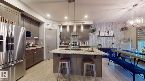 8031 Evans Crescent, Edmonton, AB - Indoor Photo Showing Kitchen With Upgraded Kitchen