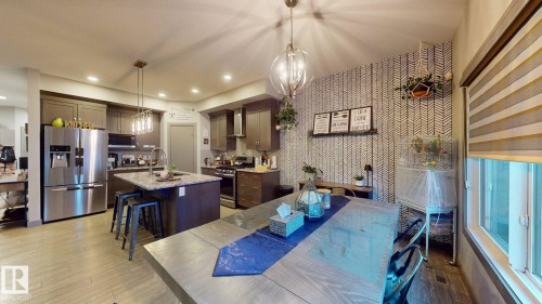 8031 Evans Crescent, Edmonton, AB - Indoor Photo Showing Kitchen With Upgraded Kitchen