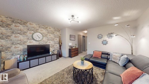 8031 Evans Crescent, Edmonton, AB - Indoor Photo Showing Living Room