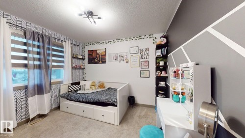 8031 Evans Crescent, Edmonton, AB - Indoor Photo Showing Bedroom