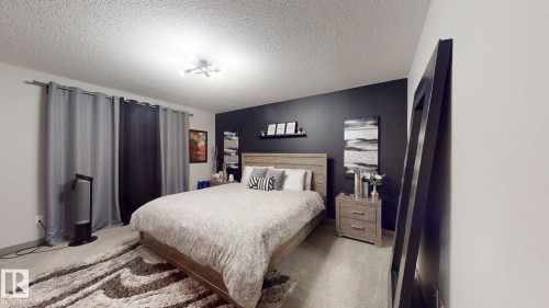 8031 Evans Crescent, Edmonton, AB - Indoor Photo Showing Bedroom