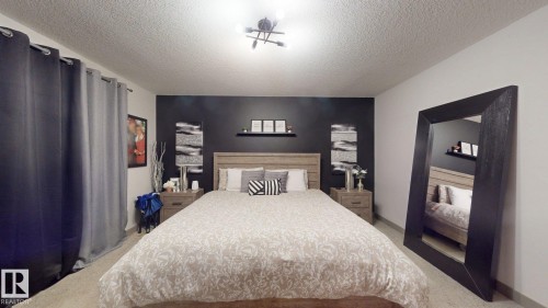 8031 Evans Crescent, Edmonton, AB - Indoor Photo Showing Bedroom