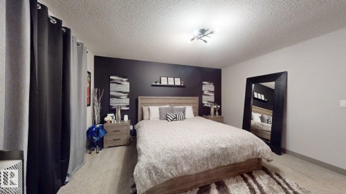 8031 Evans Crescent, Edmonton, AB - Indoor Photo Showing Bedroom