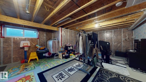 8031 Evans Crescent, Edmonton, AB - Indoor Photo Showing Basement