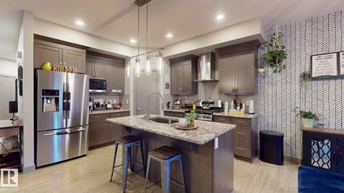 8031 Evans Crescent, Edmonton, AB - Indoor Photo Showing Kitchen With Upgraded Kitchen