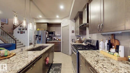 8031 Evans Crescent, Edmonton, AB - Indoor Photo Showing Kitchen With Upgraded Kitchen