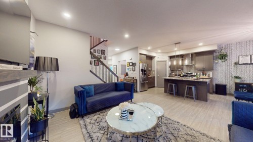 8031 Evans Crescent, Edmonton, AB - Indoor Photo Showing Living Room