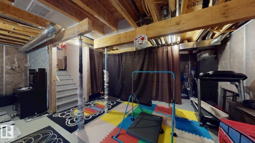 8031 Evans Crescent, Edmonton, AB - Indoor Photo Showing Basement