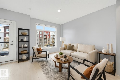 Virtually staged living room - 16 804 Welsh Drive, Edmonton, AB - Indoor Photo Showing Living Room