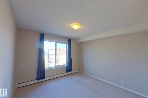 414 11820 22 Avenue, Edmonton, AB - Indoor Photo Showing Other Room