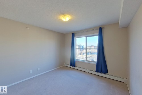 414 11820 22 Avenue, Edmonton, AB - Indoor Photo Showing Other Room