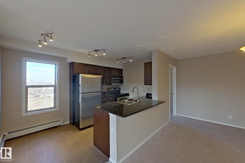 414 11820 22 Avenue, Edmonton, AB - Indoor Photo Showing Kitchen With Double Sink