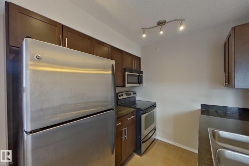 414 11820 22 Avenue, Edmonton, AB - Indoor Photo Showing Kitchen With Stainless Steel Kitchen