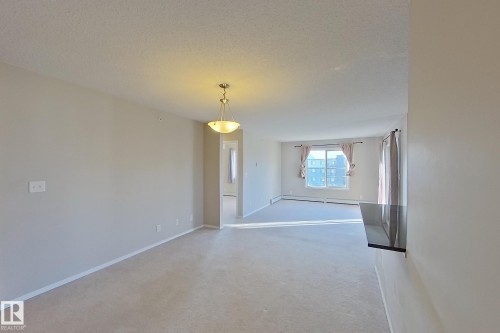 414 11820 22 Avenue, Edmonton, AB - Indoor Photo Showing Other Room
