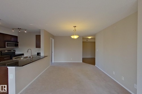 414 11820 22 Avenue, Edmonton, AB - Indoor Photo Showing Kitchen With Double Sink