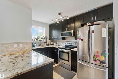11438 97 Street, Edmonton, AB - Indoor Photo Showing Kitchen With Double Sink With Upgraded Kitchen