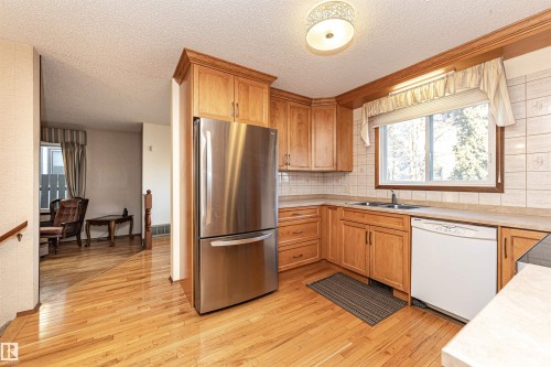 18408 55 Avenue, Edmonton, AB - Indoor Photo Showing Kitchen With Double Sink