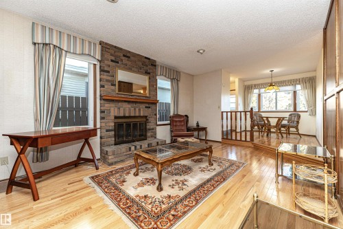 18408 55 Avenue, Edmonton, AB - Indoor Photo Showing Living Room With Fireplace