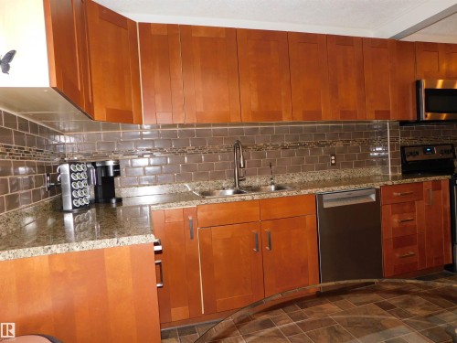104 Greenfield Estates, St. Albert, AB - Indoor Photo Showing Kitchen With Double Sink