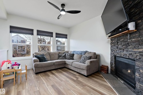 341 Southfork Drive, Leduc, AB - Indoor Photo Showing Living Room With Fireplace